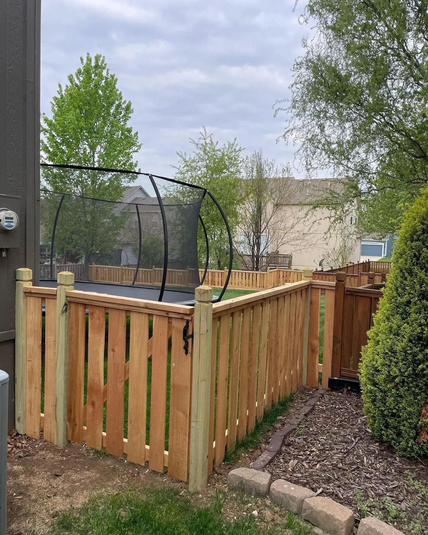 Rock-solid cedar fence install in Raymore, MO by RKC Wood Care Pros