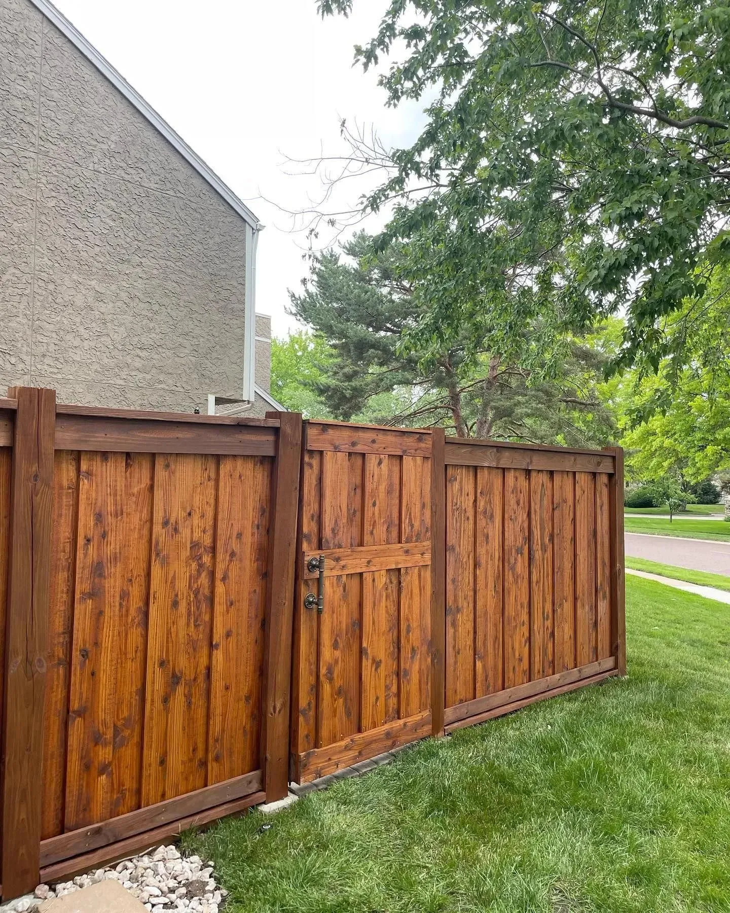 Cedar privacy fence installation in Olathe, KS — RKC Wood Care Pros