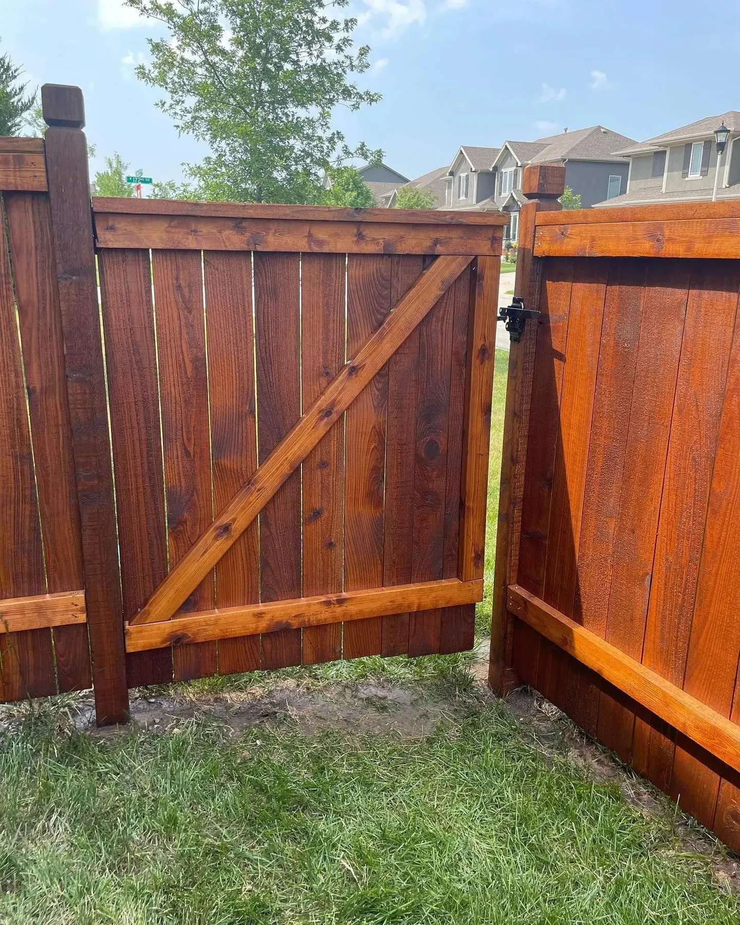 Black ornamental fence panel at a KC metro residence — RKC Wood Care Pros