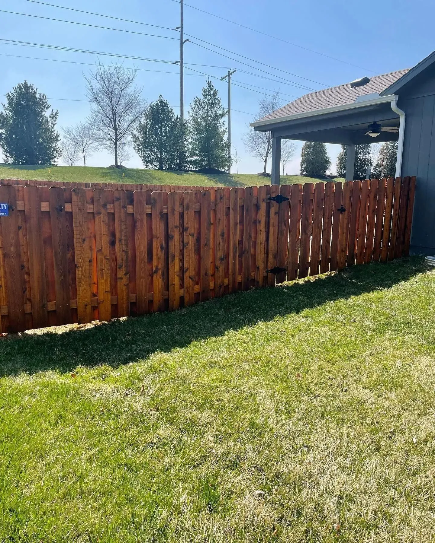 Horizontal slat wood fence panel in Leawood, KS — RKC Wood Care Pros