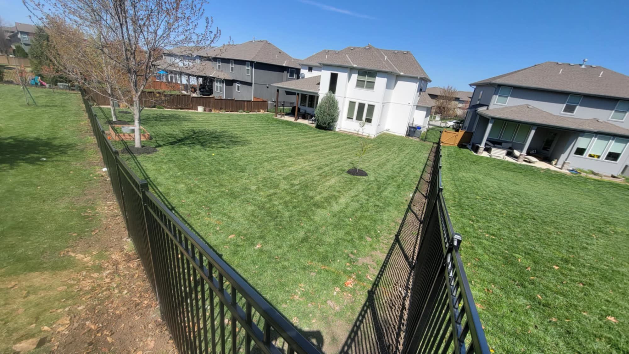 Decorative aluminum fence contractor in Kansas City by RKC Wood Care Pros