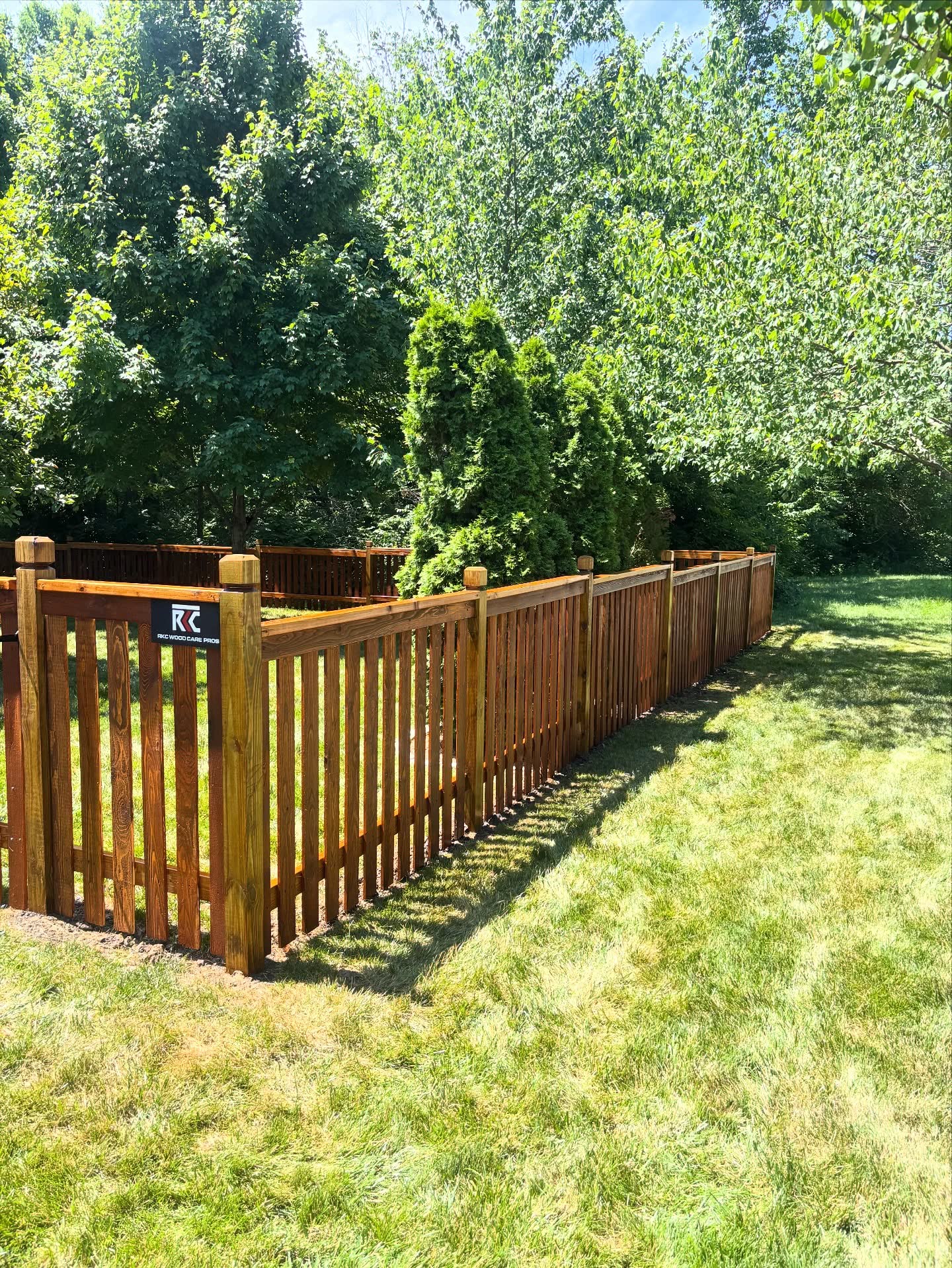 Cedar fence in Bonner Springs, KS by RKC Wood Care Pros