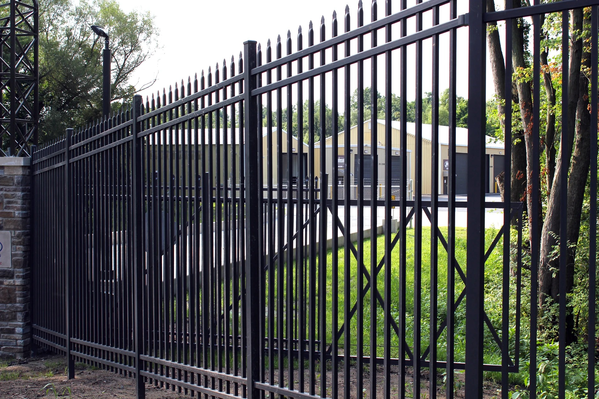 Ornamental aluminum accent fence in a Grain Valley home by RKC Wood Care Pros
